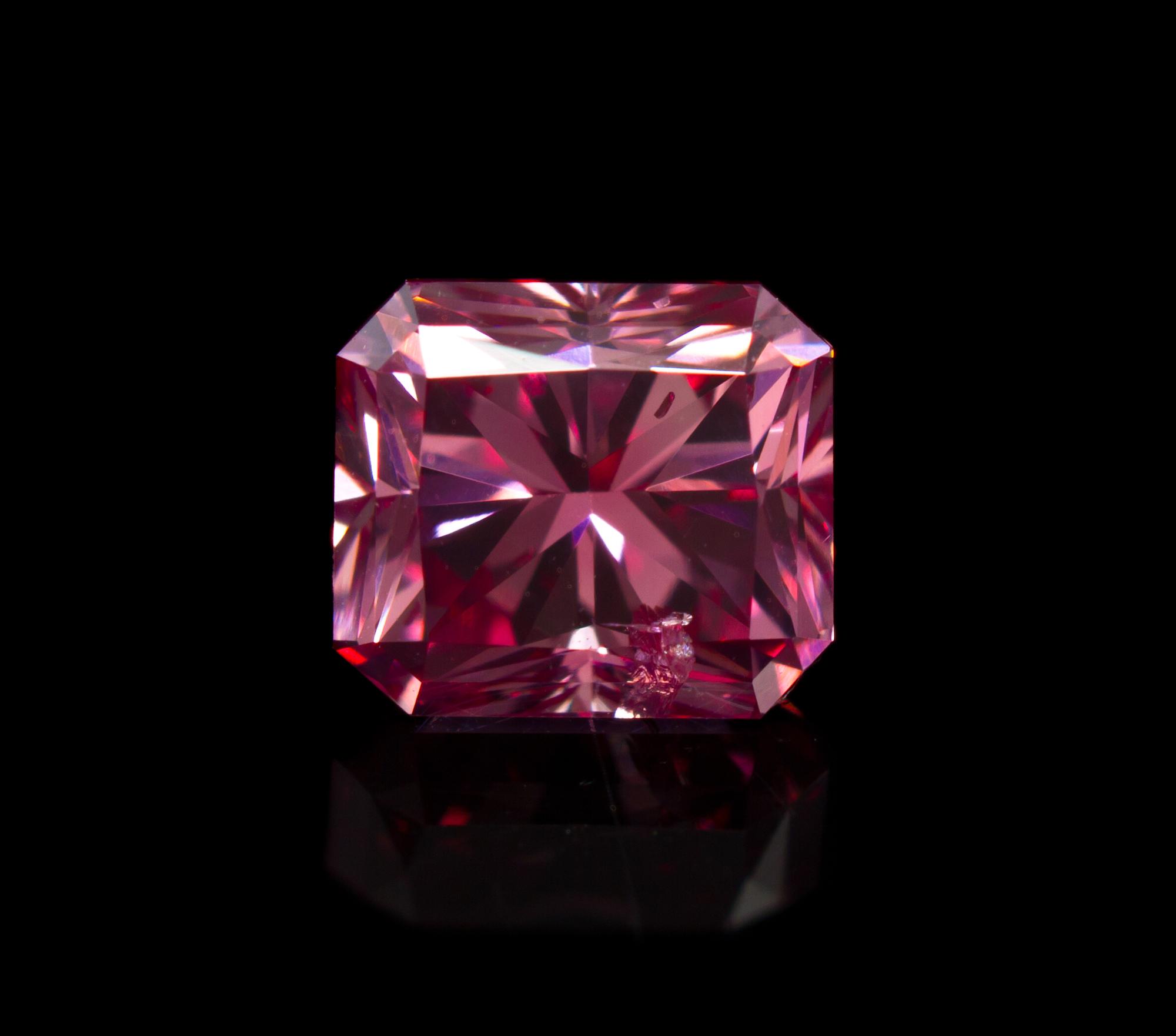 A 0.59 Carat Radiant Cut Fancy Deep Pink Diamond,
