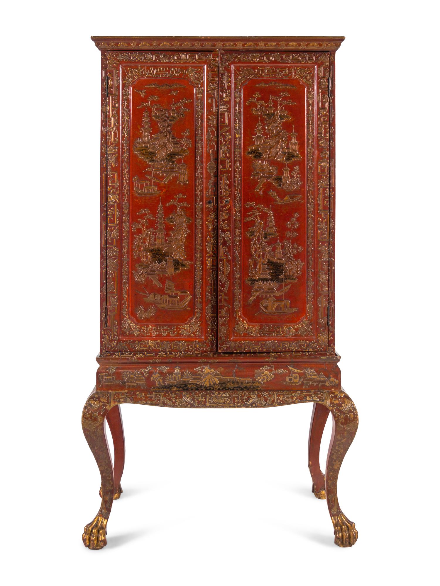 A Large Gilt Decorated Red Lacquered Cabinet on Stand