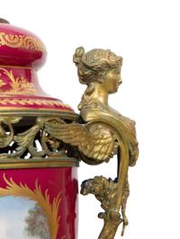 A Pair of Gilt Bronze Mounted Sevres Style Porcelain Covered Urns