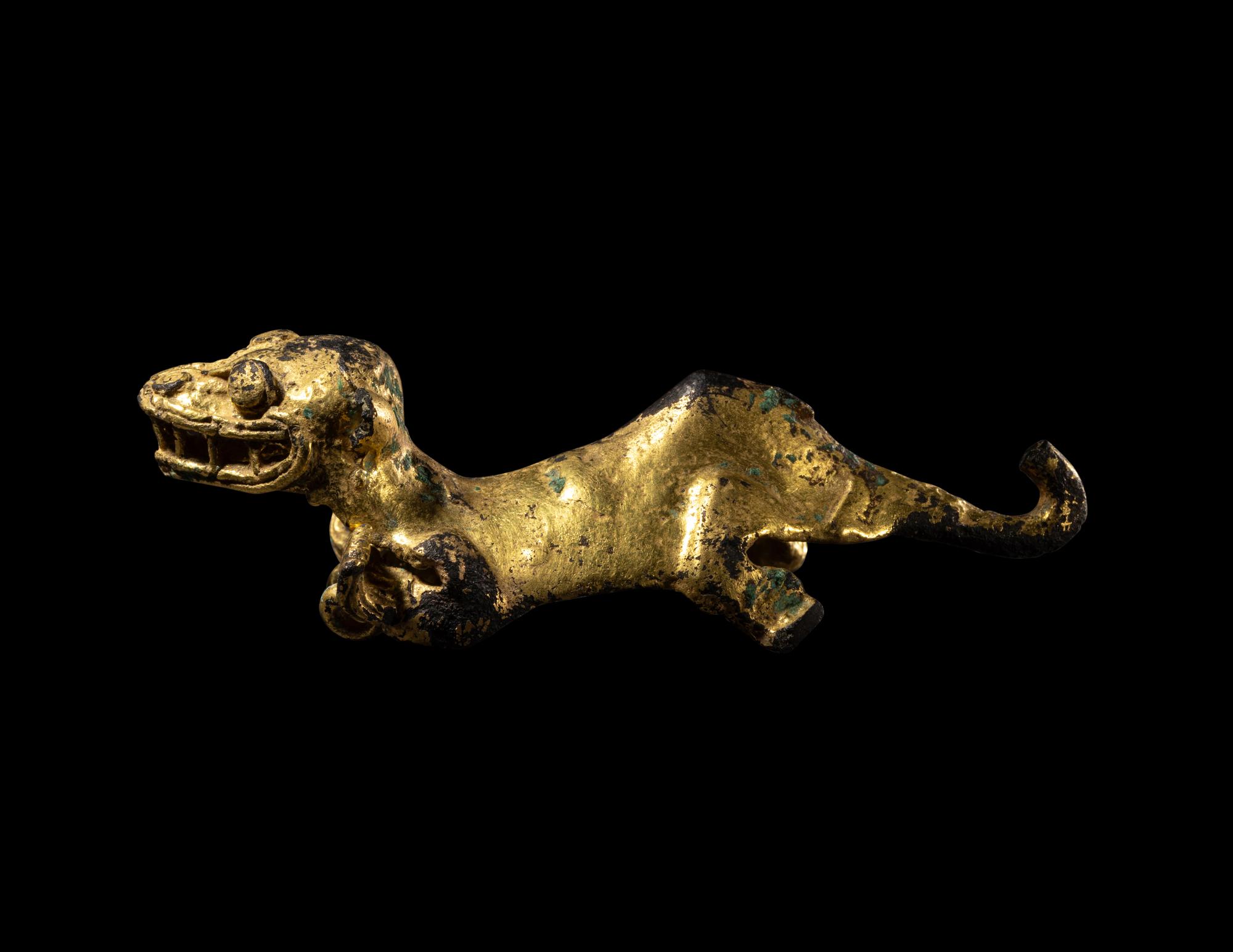 A Diquis Gold-Plated Feline Pendant