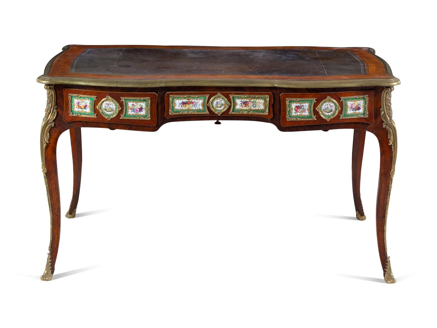 A Louis XV Style Gilt Bronze and Sèvres Style Porcelain Mounted Kingwood Bureau Plat