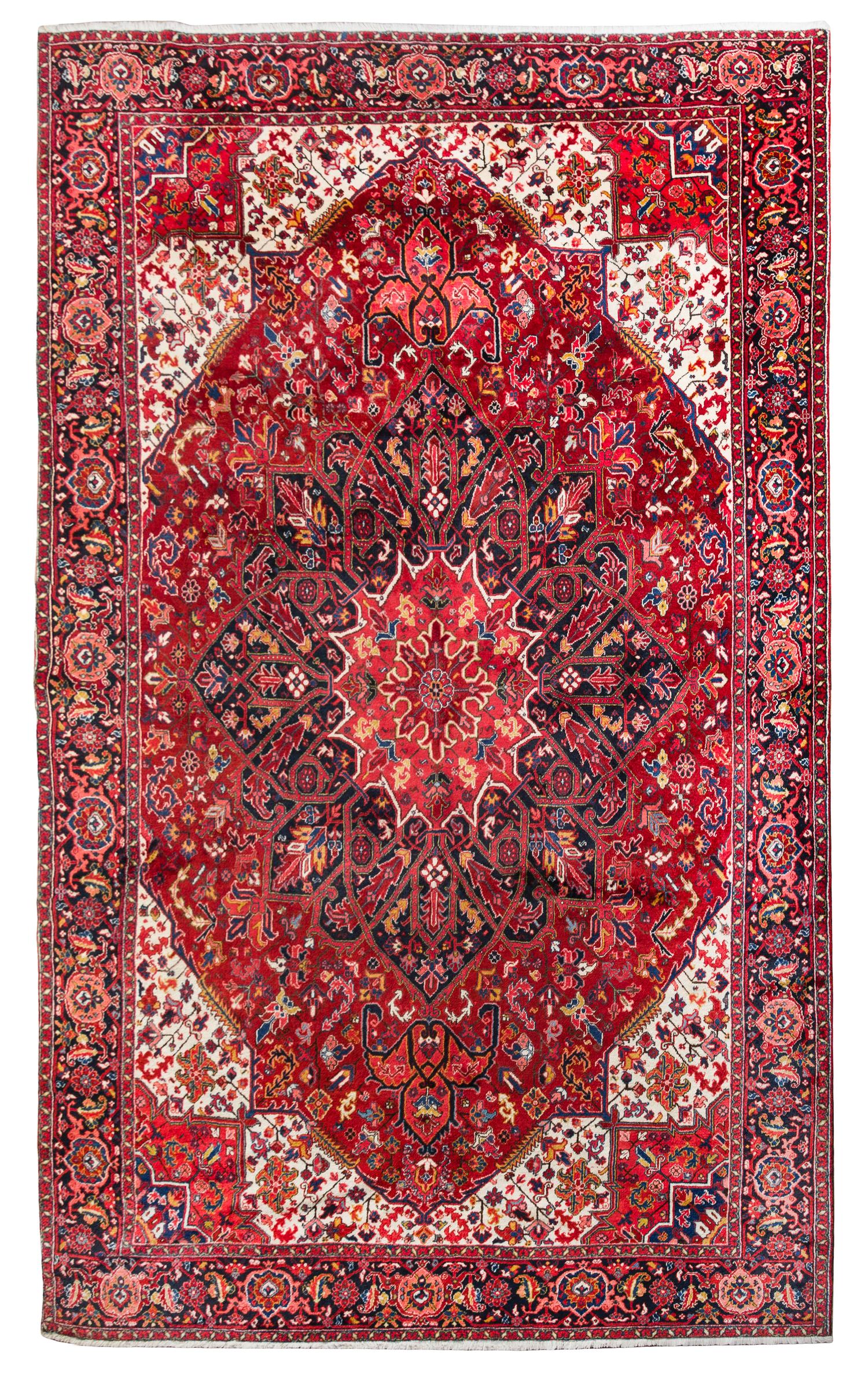 A Heriz Wool Rug 13 feet 6 inches x 10 feet 1 inch.