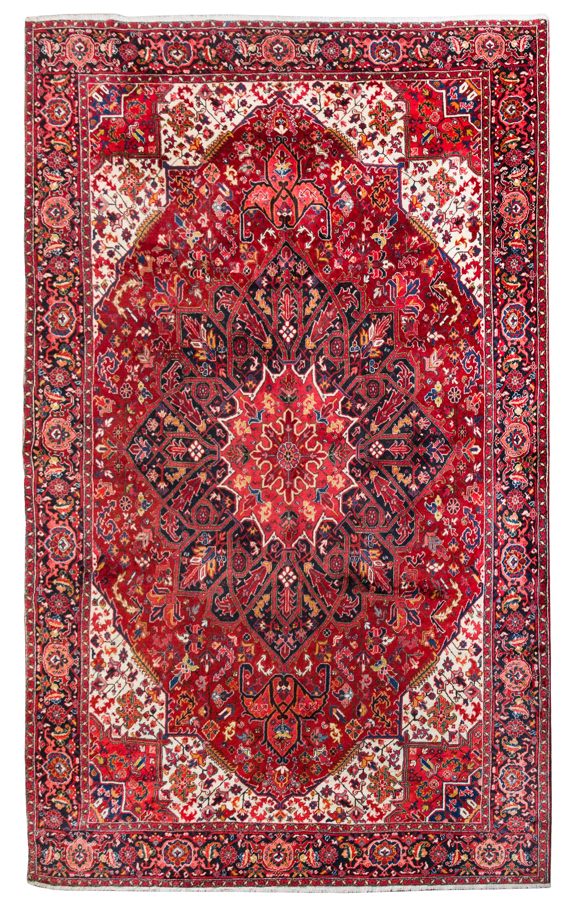 A Heriz Wool Rug 13 feet 6 inches x 10 feet 1 inch.