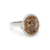 FANCY DARK YELLOWISH BROWN DIAMOND AND DIAMOND RING