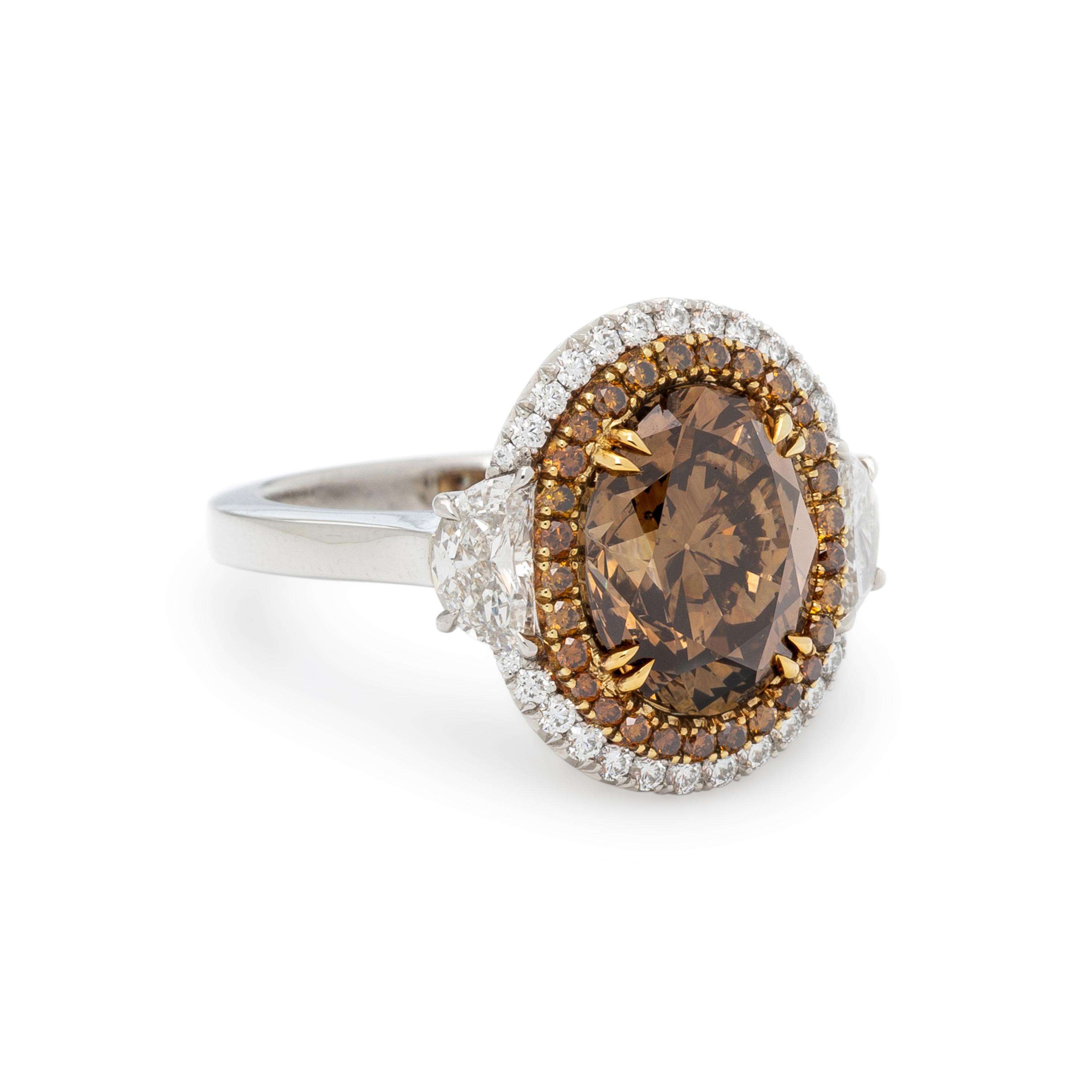 FANCY DARK YELLOWISH BROWN DIAMOND AND DIAMOND RING