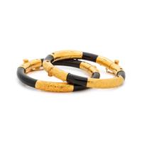HIGH KARAT GOLD AND WOOD BANGLE SET