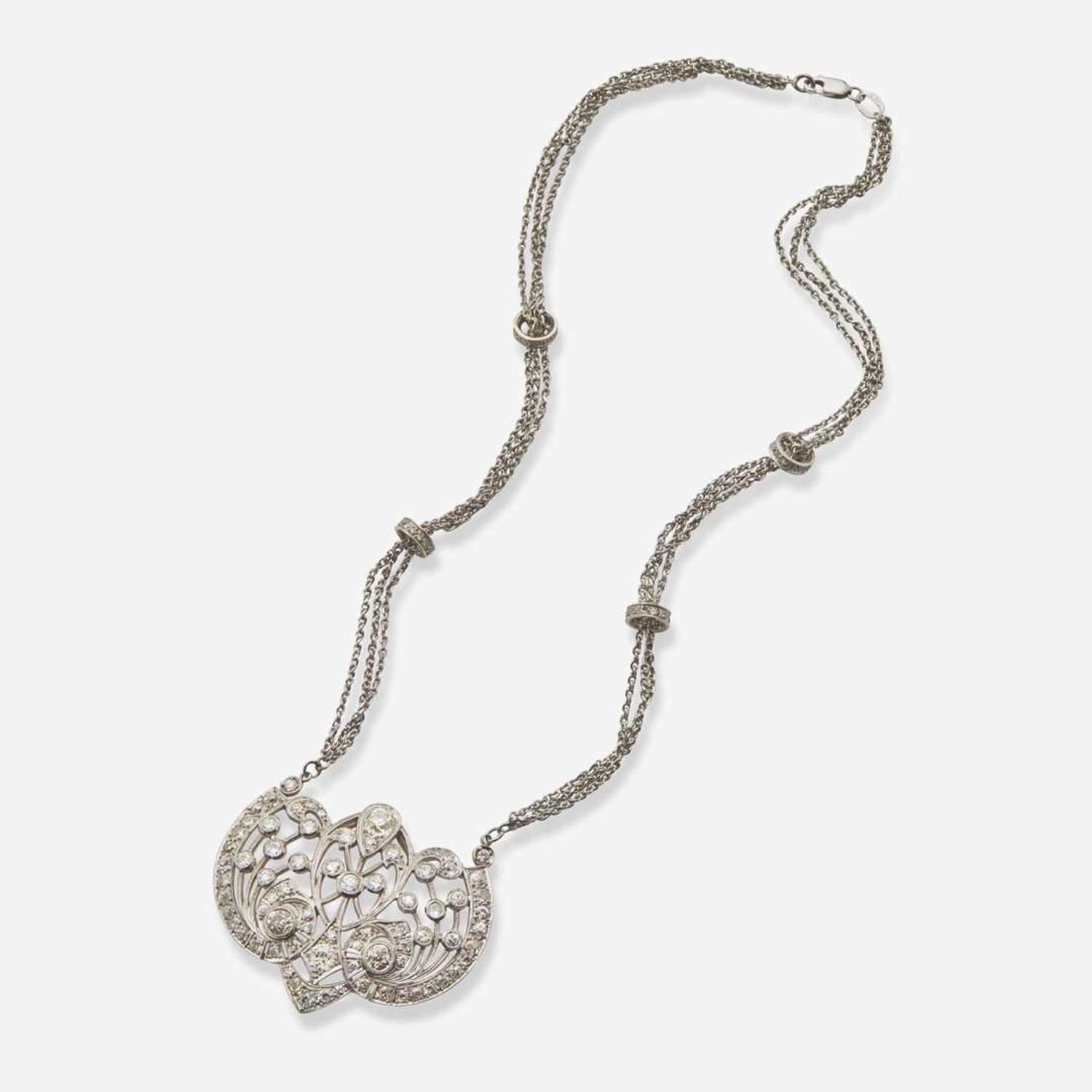 An Edwardian Platinum and Diamond Pendant on Chain