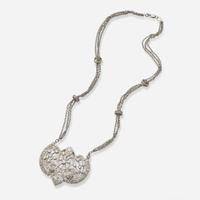 An Edwardian Platinum and Diamond Pendant on Chain