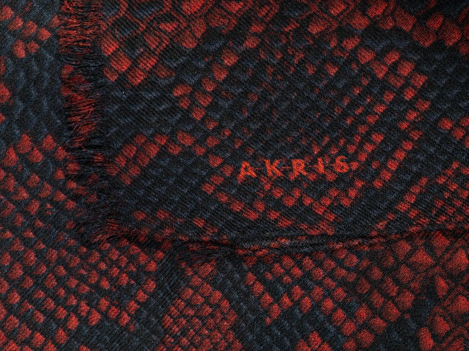 Seven Designer Scarves: One Brunello Cucinelli, Two Eskandar, One Akris, One Hermès, One Loro Piana, One Yves Saint Laurent Rive Gauche