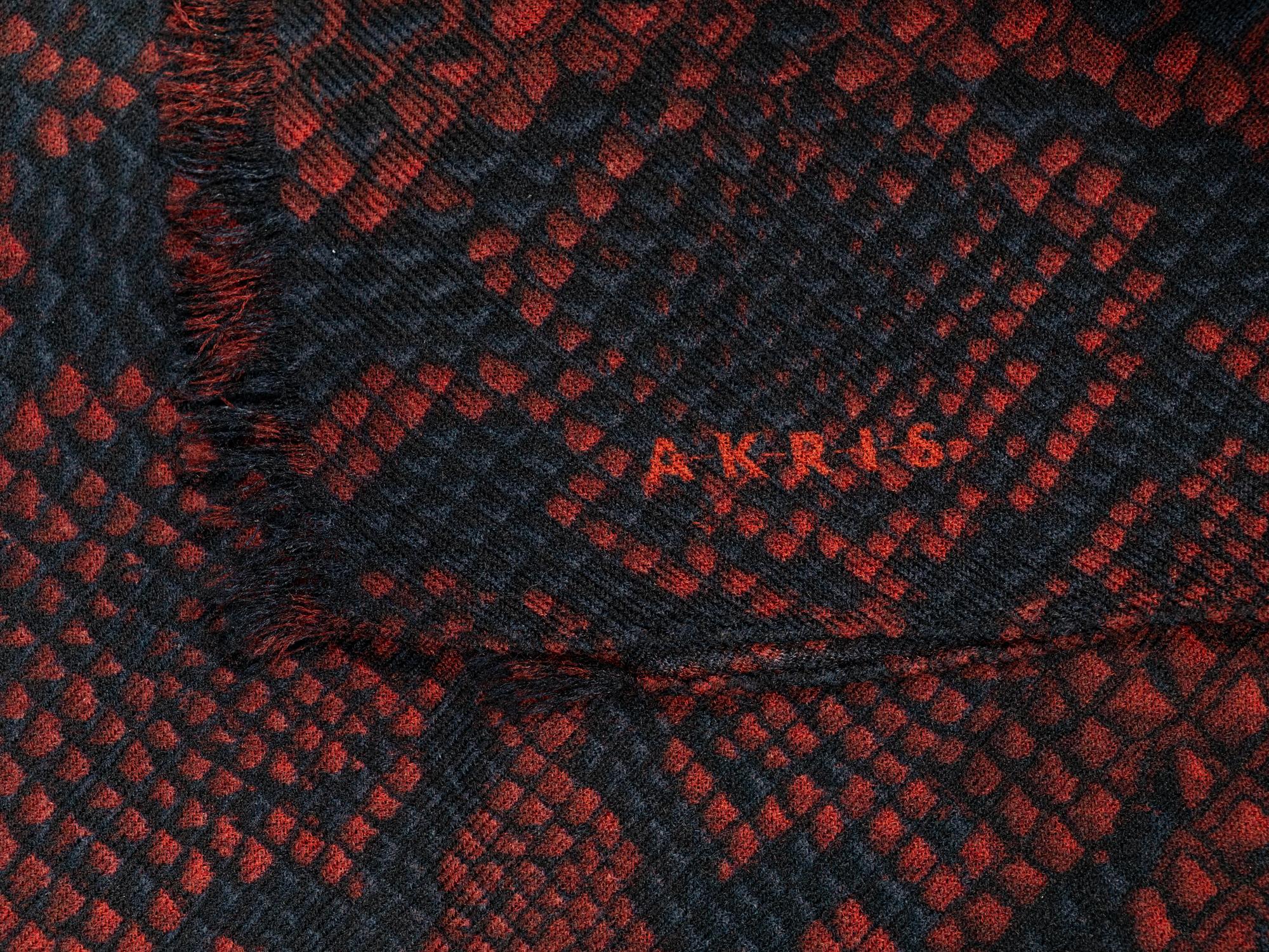 Seven Designer Scarves: One Brunello Cucinelli, Two Eskandar, One Akris, One Hermès, One Loro Piana, One Yves Saint Laurent Rive Gauche