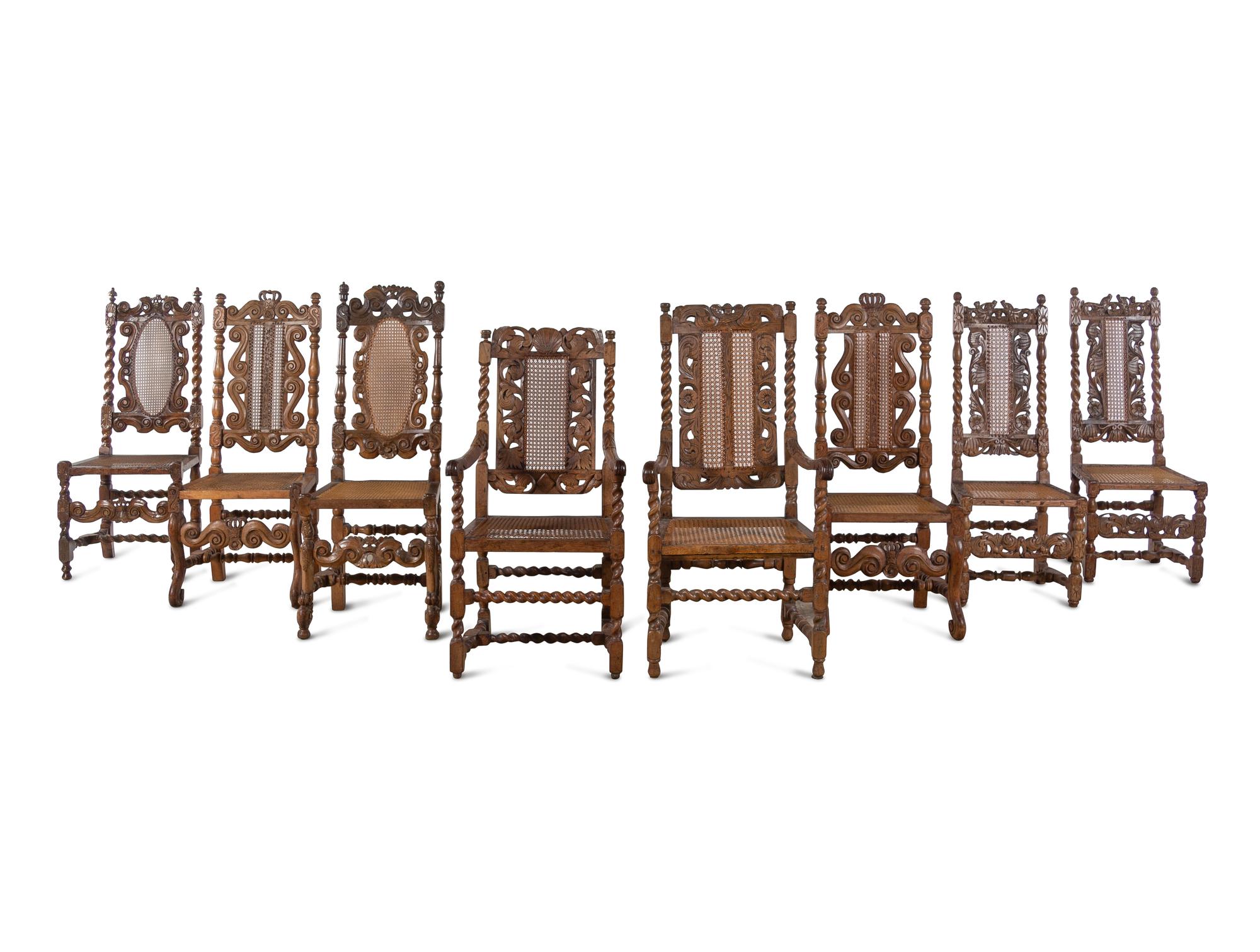 An Assembled Set of Eight English Baroque Walnut Cane-Upholstered Dining Chairs