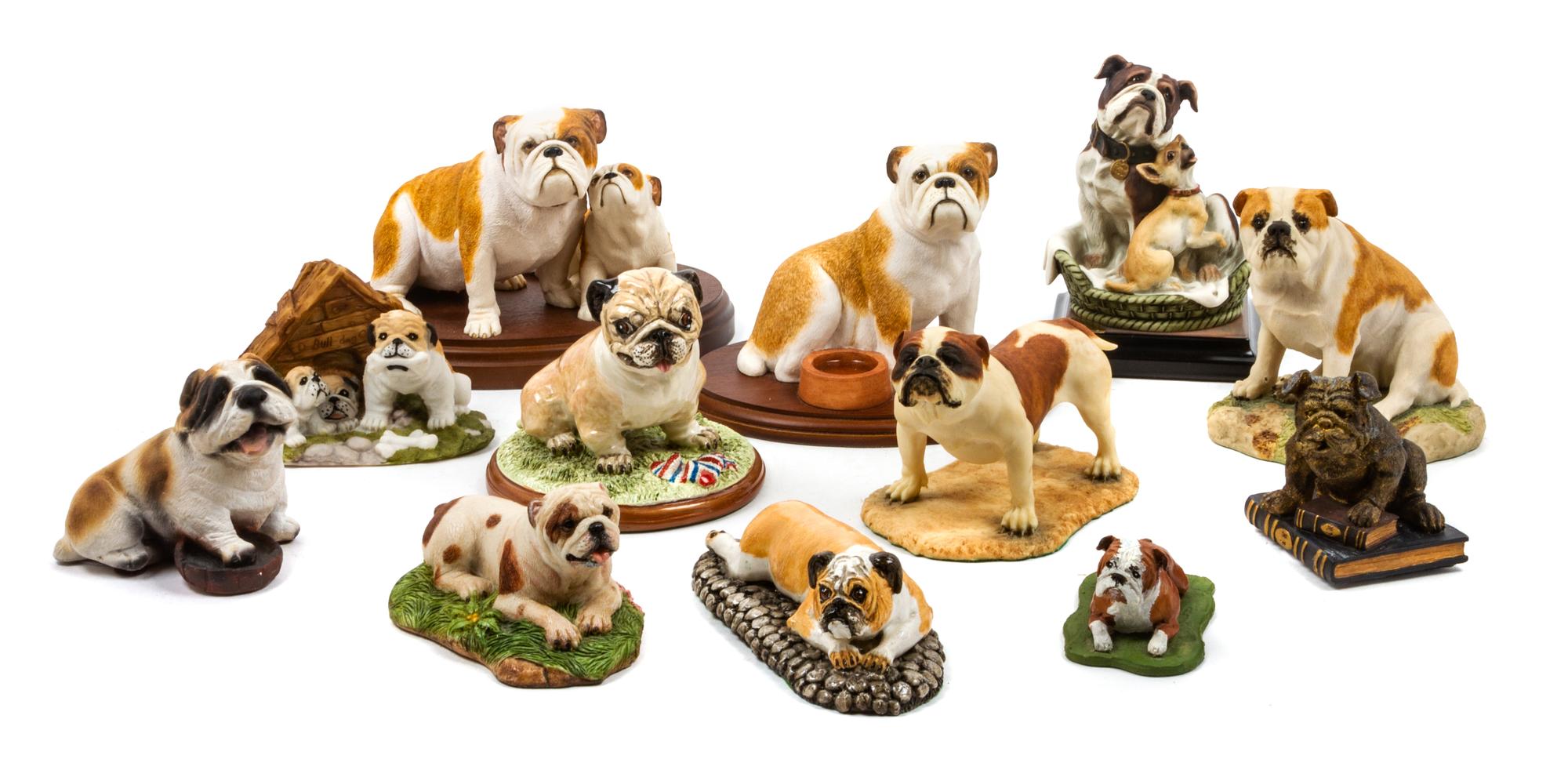 A Group of Twelve Ceramic Bulldog Figures Width of widest 8 1/2 inches.