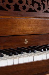 A Steinway and Sons Rosewood Square Piano