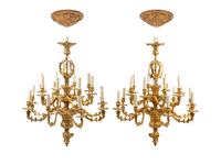 A Pair of Louis XV Style Gilt Bronze Sixteen-Light Chandeliers