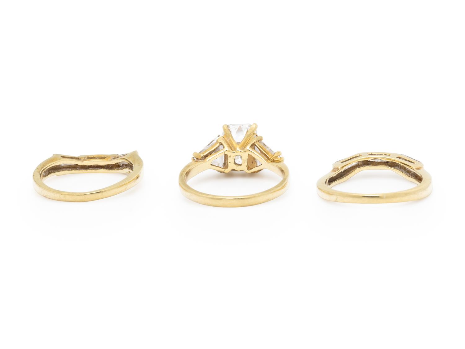 DIAMOND AND YELLOW GOLD RING WITH TWO GUARD RINGS