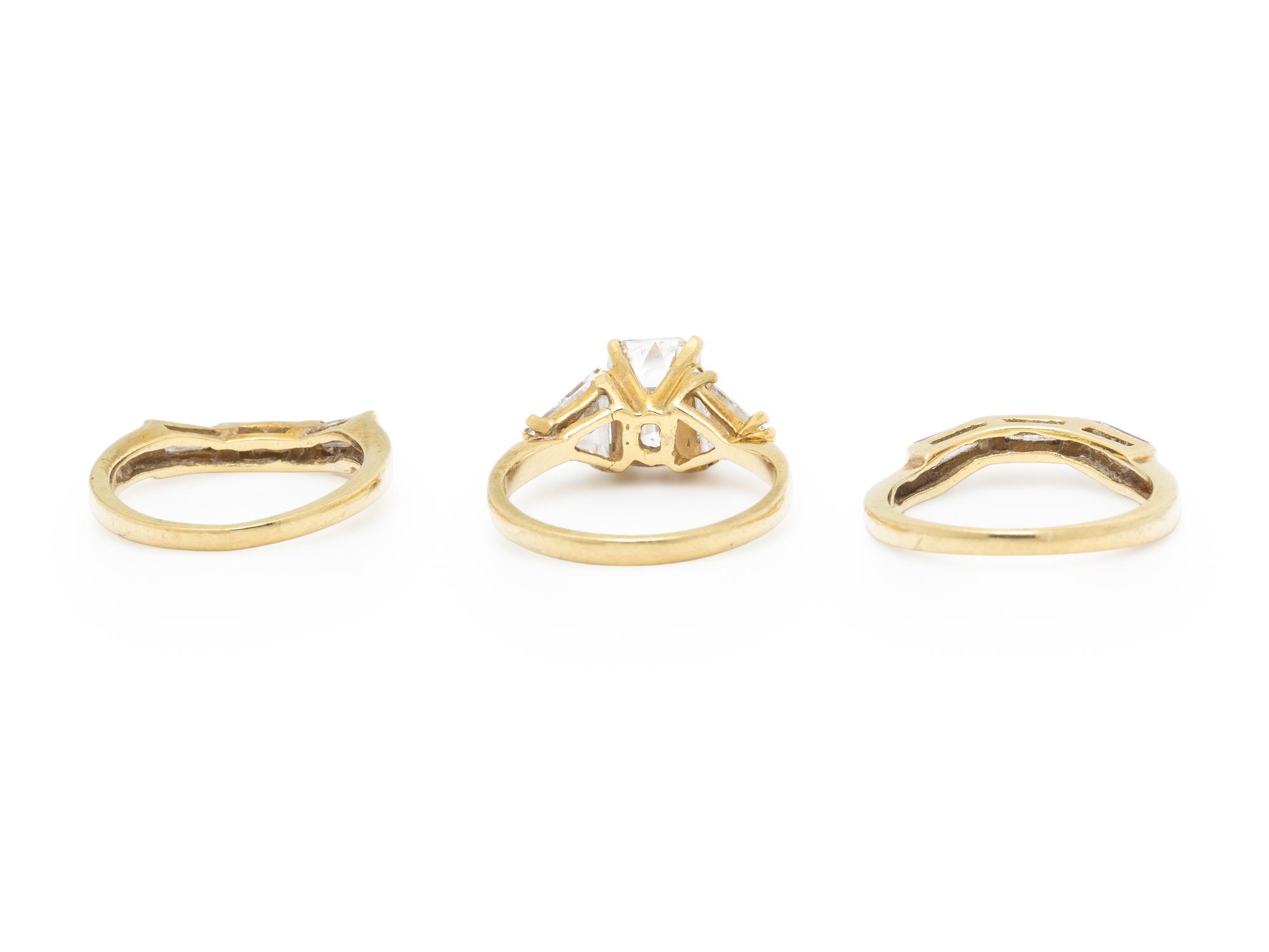 DIAMOND AND YELLOW GOLD RING WITH TWO GUARD RINGS