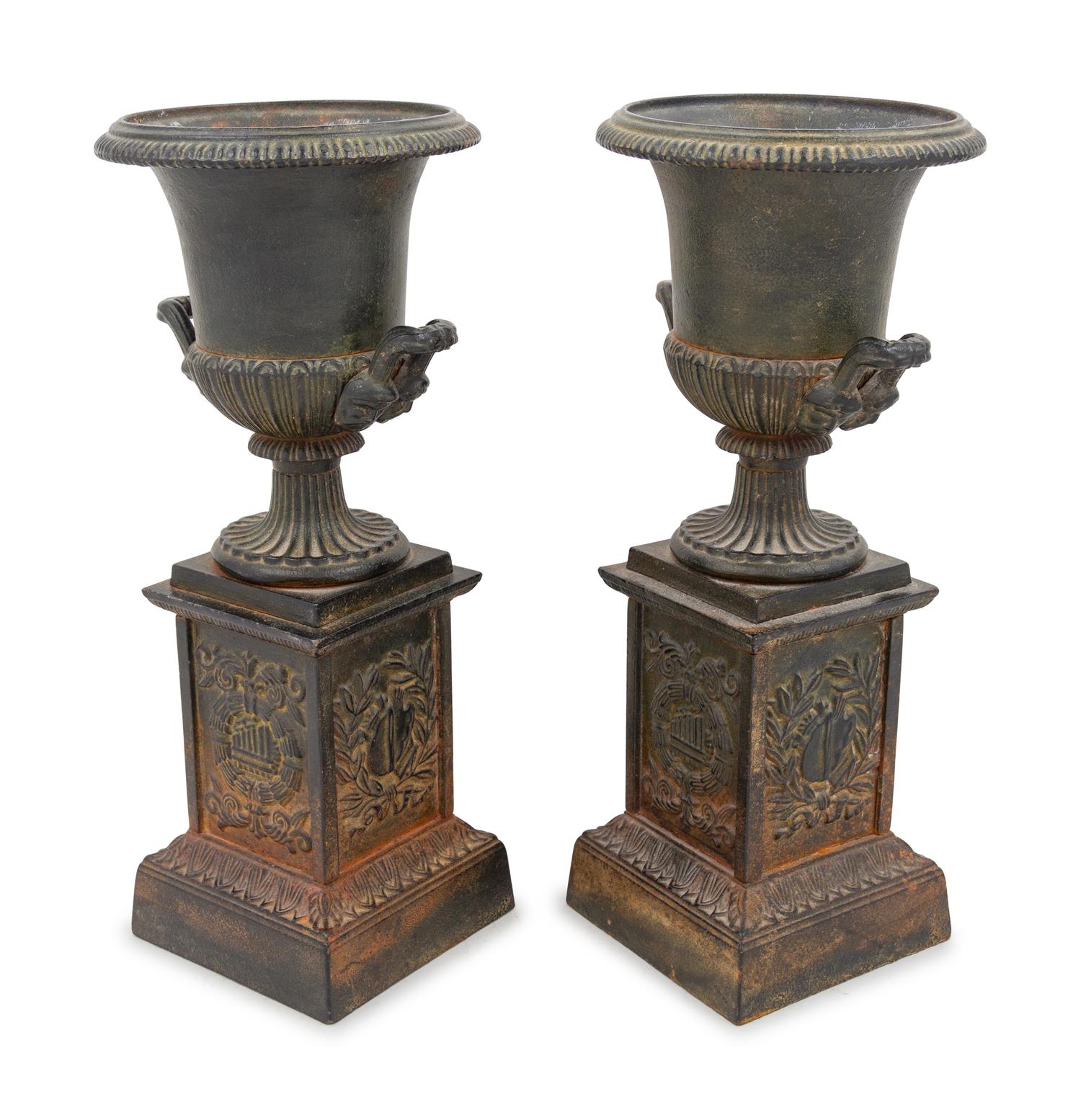 A Pair of French Cast Iron Urns