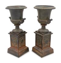 A Pair of French Cast Iron Urns