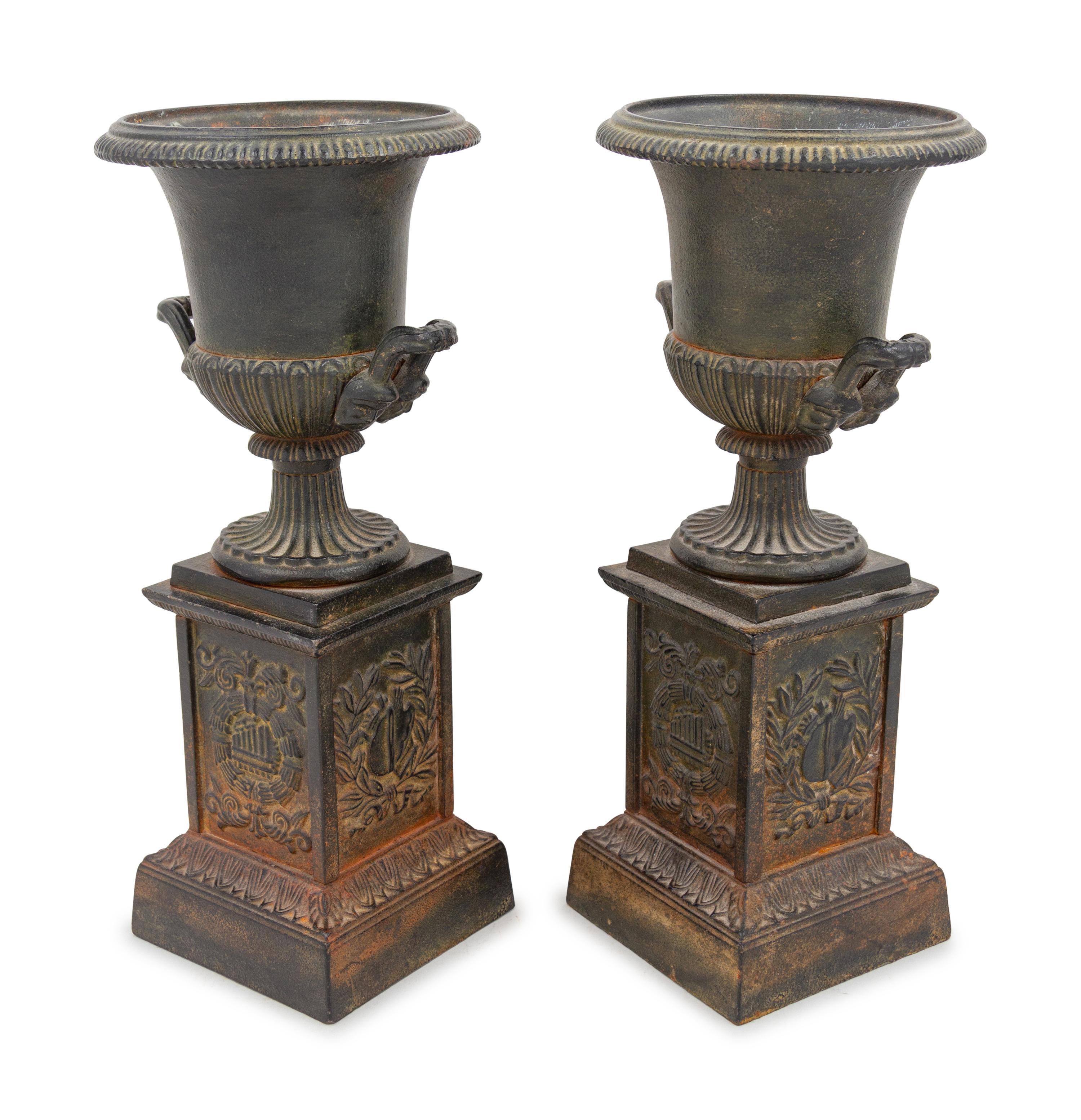 A Pair of French Cast Iron Urns