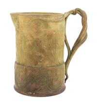An Art Nouveau Ceramic Ewer Height 7 1/8 inches.