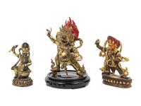 Three Tibetan Gilt Bronze Figures of Guardians