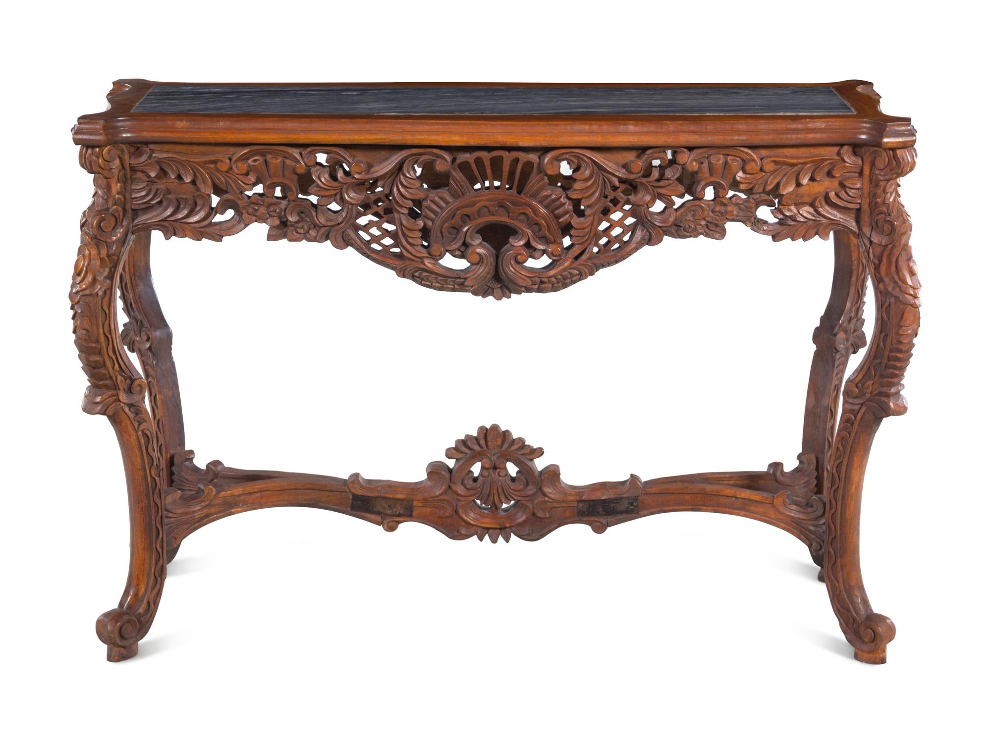 An Italian Carved Walnut Marble-Top Console Table