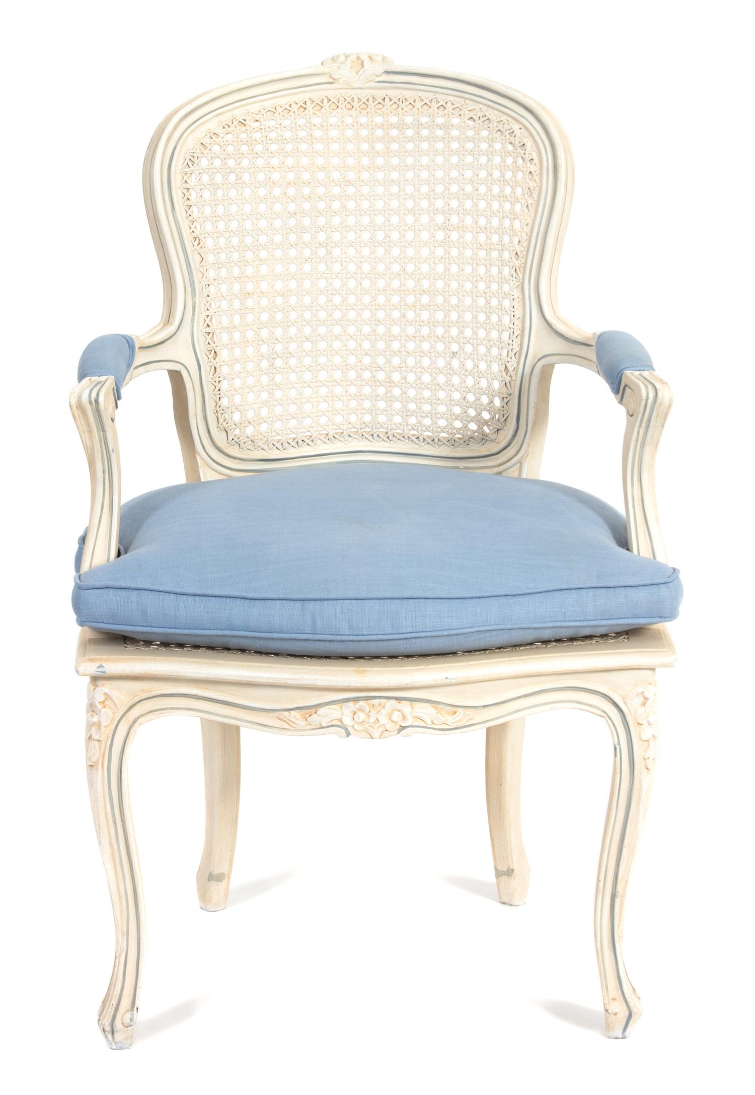 A Louis XV Style Carved and Painted Cane Back and Seat Fauteuil Height 36 inches. — 20TH CENTURY