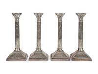 A Set of Four English Silver-Plate Candlesticks
