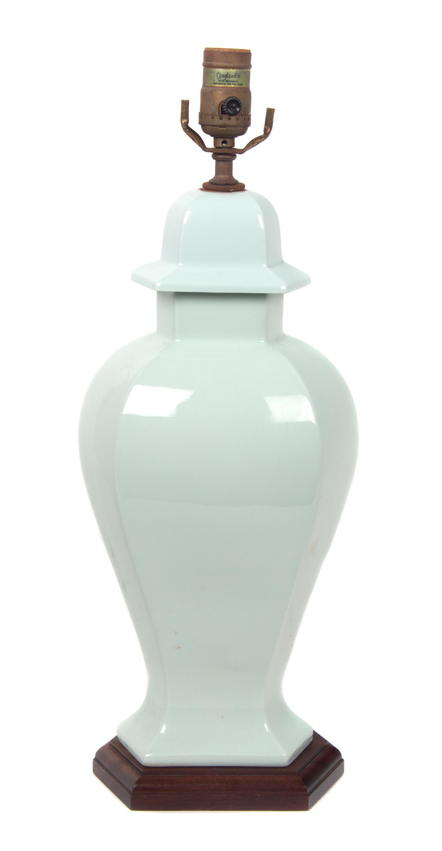 A Pale Blue Ceramic Vase Height overall 20 inches.