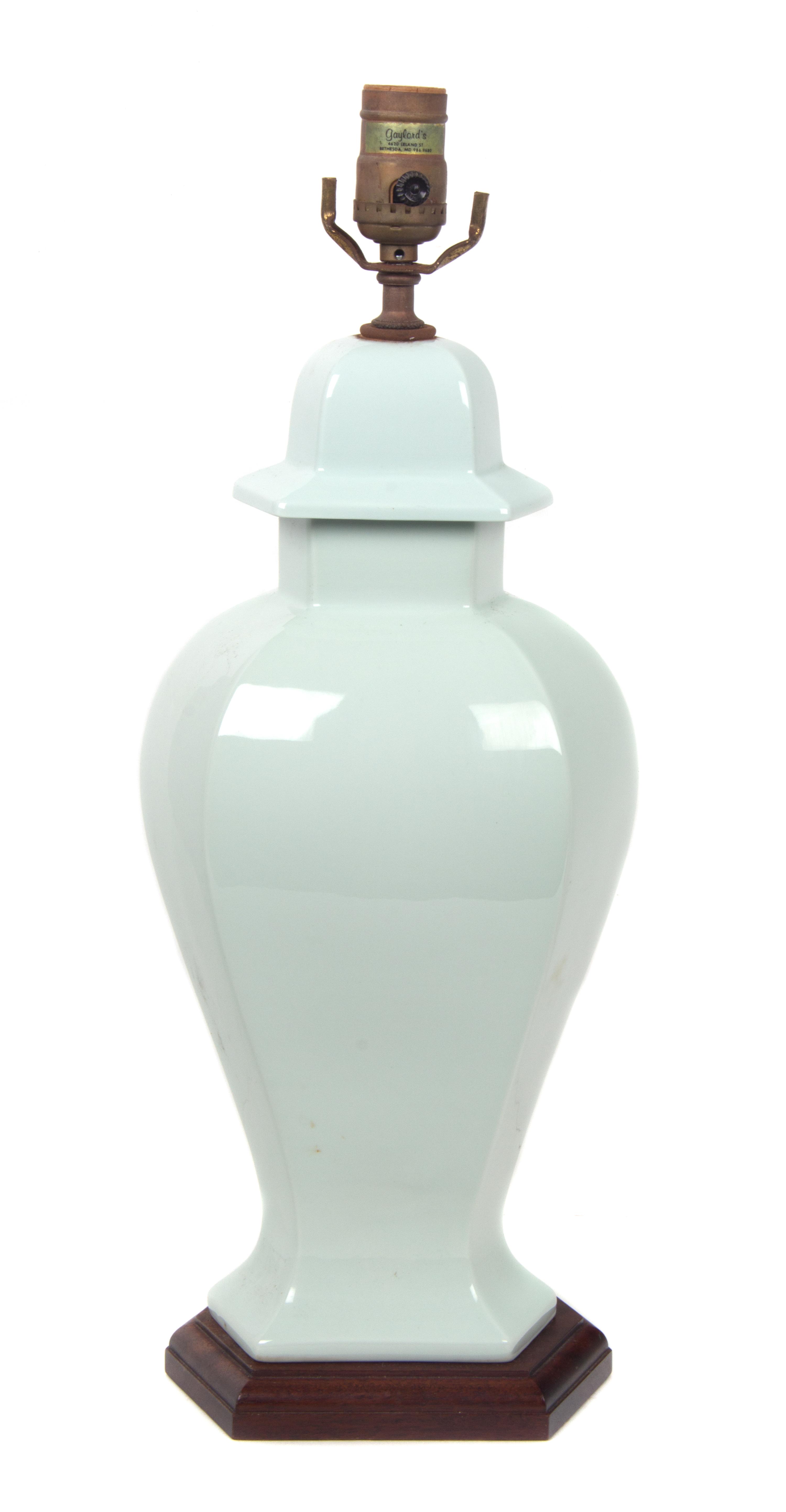A Pale Blue Ceramic Vase Height overall 20 inches.