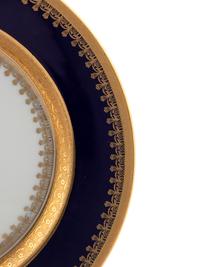 A Set of Sixteen Czechoslovakian Porcelain Dinner Plates