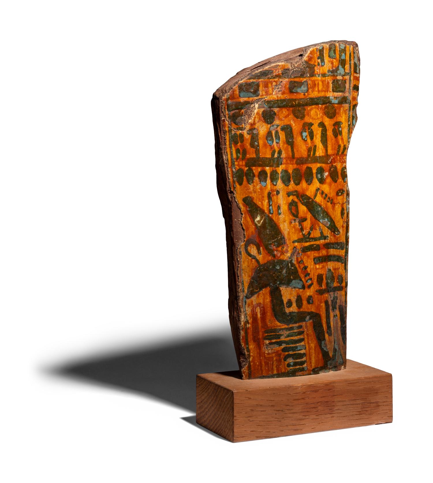 An Egyptian Painted Wood Sarcophagus Fragment