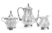 A Mexican Silver Three-Piece Coffee Service, Sanborns, Mexico City, comprising a coffee pot, a covered sugar and a creamer, each having