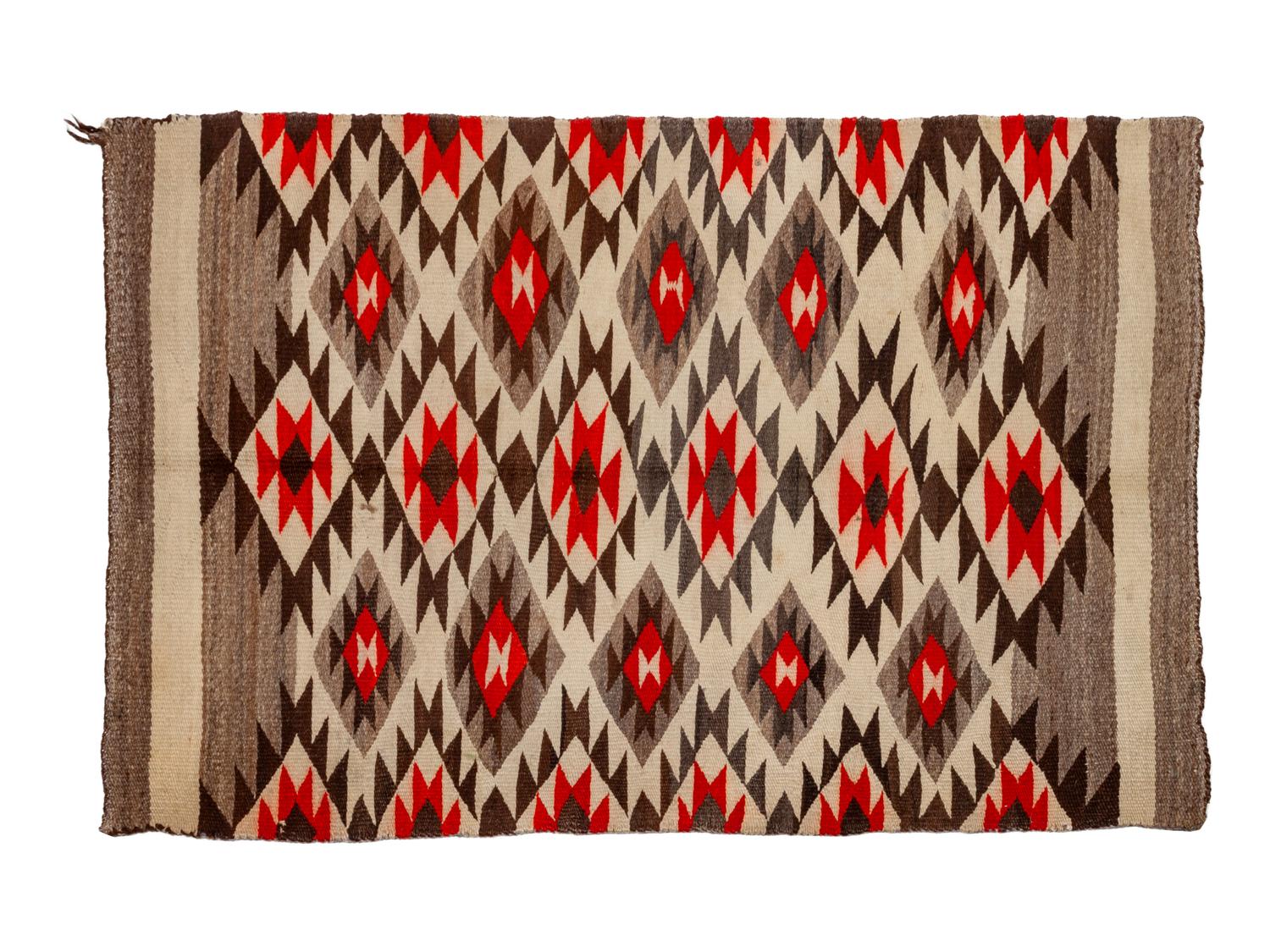 Group of Four Regional Navajo Rugs