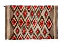 Group of Four Regional Navajo Rugs