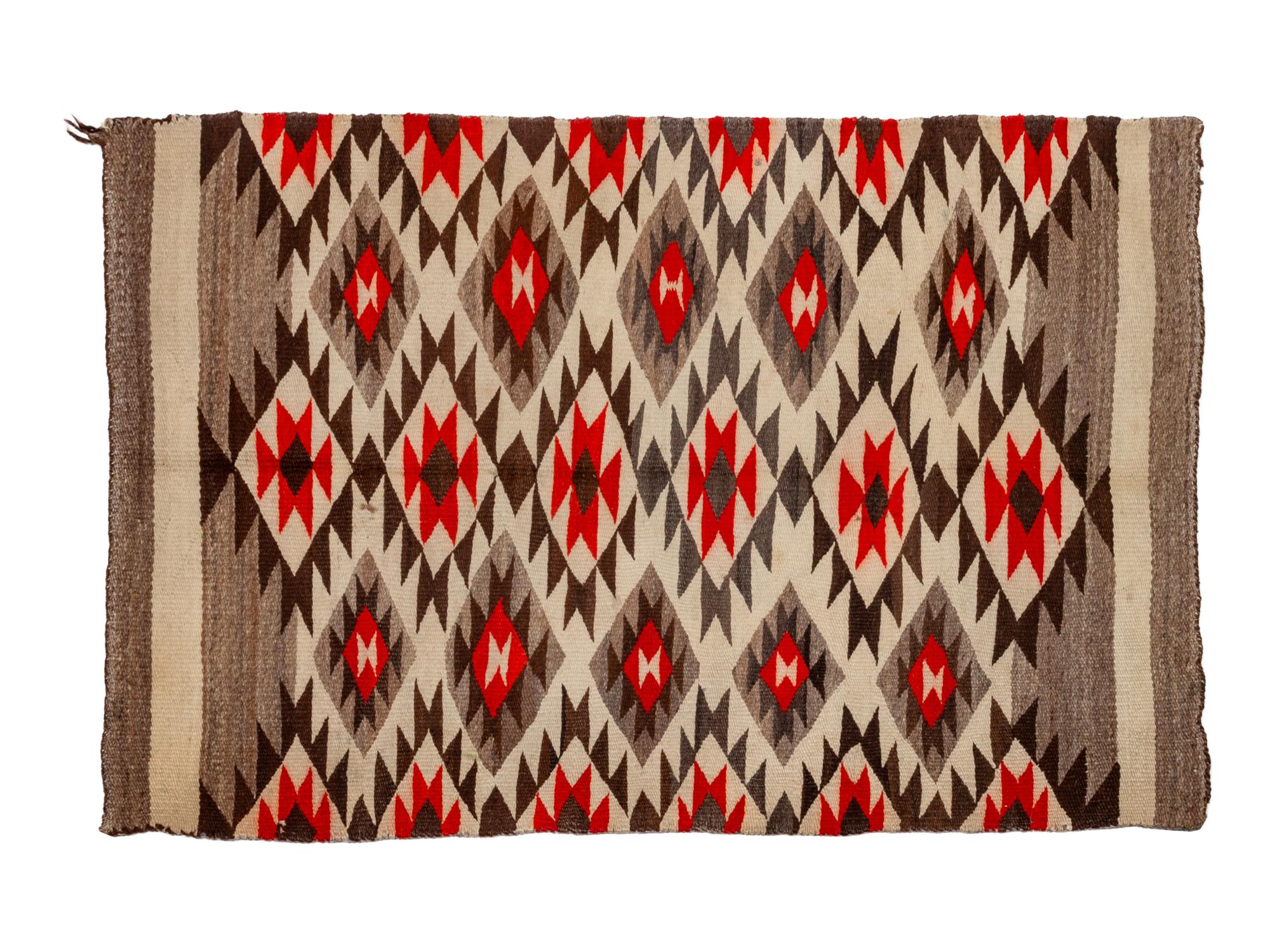 Group of Four Regional Navajo Rugs