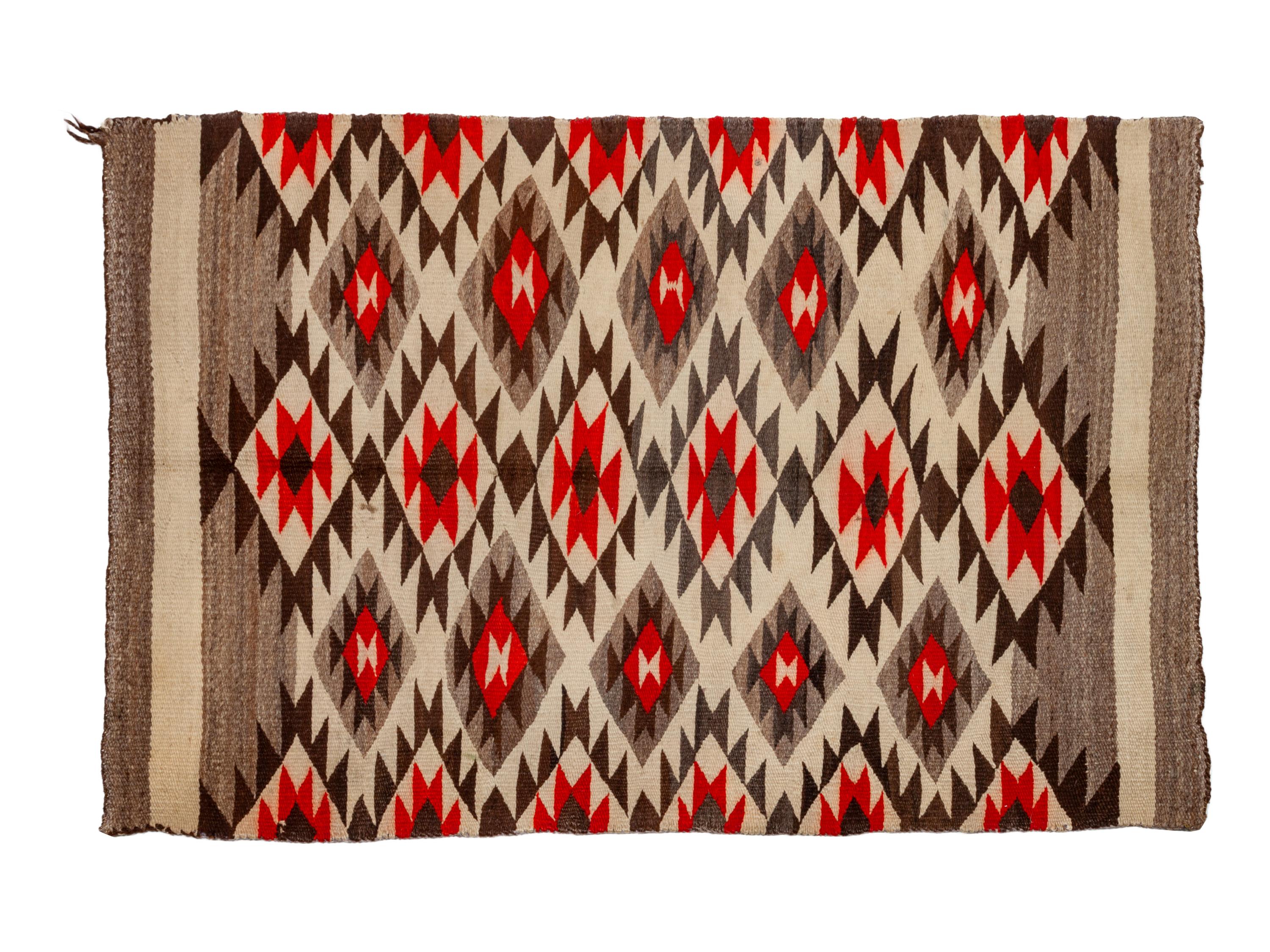 Group of Four Regional Navajo Rugs