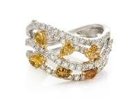 An 18 Karat White Gold, Colored Diamond and Diamond Ring, 5.40 dwts.