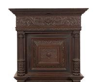 A Pair of Continental Carved Oak Cabinets on Stands