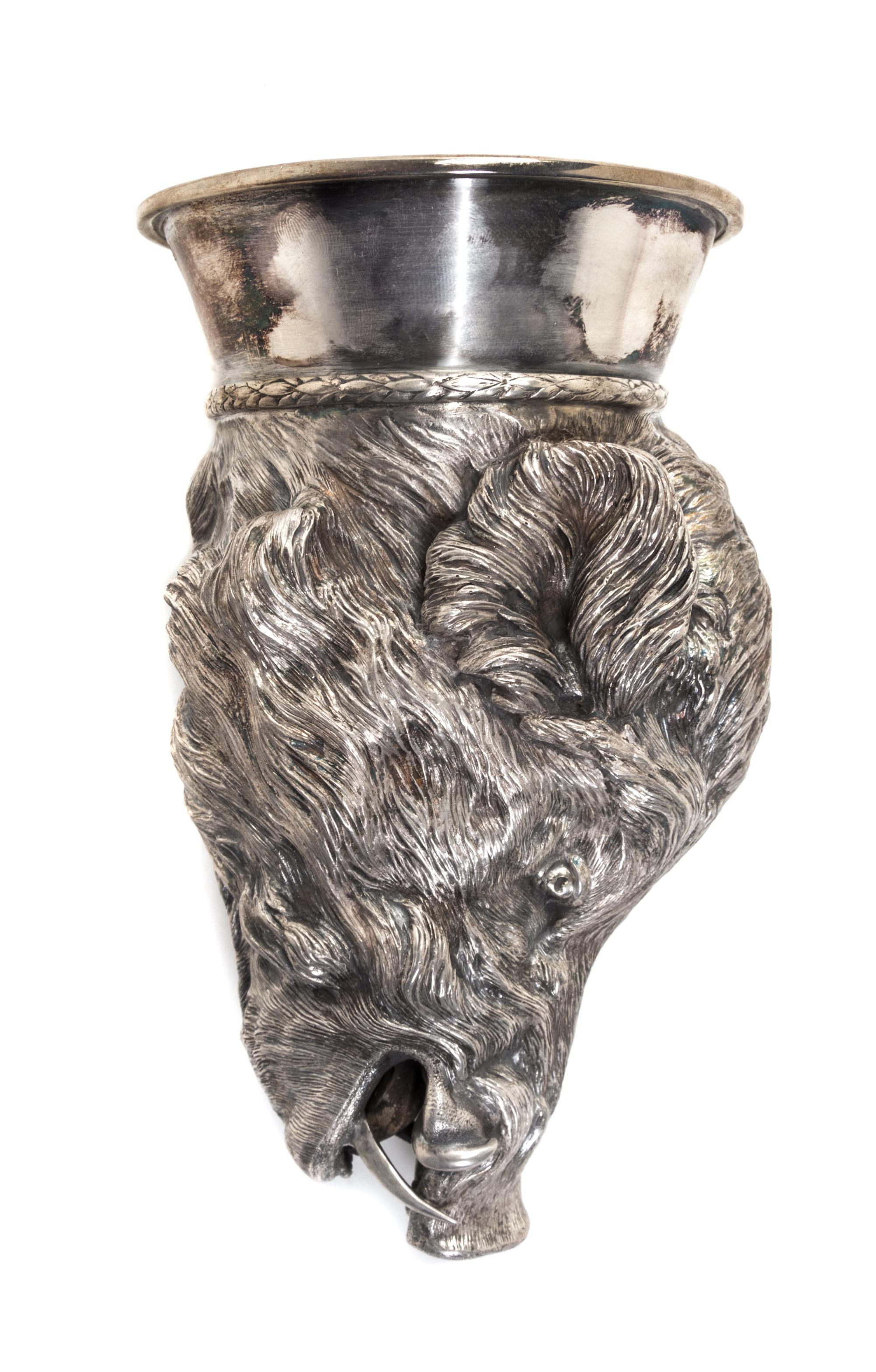 A Russian Silver Figural Stirrup Cup, Probably Andrei Antonov, Moscow, 1885, in the form of a boar's head with gilt interior.