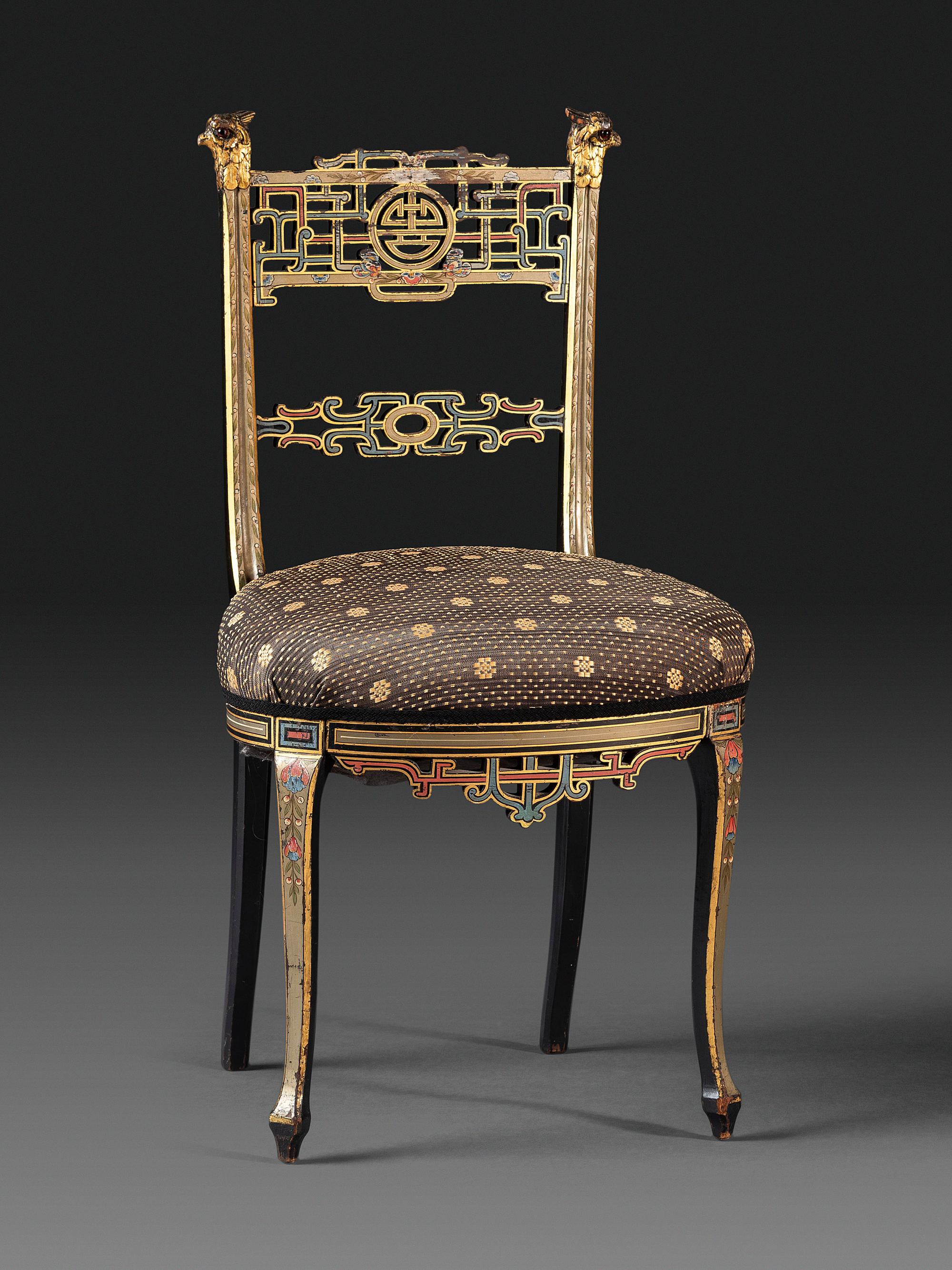 An Aesthetic Movement Painted, Parcel Gilt and Ebonized Bird-Carved Side Chair