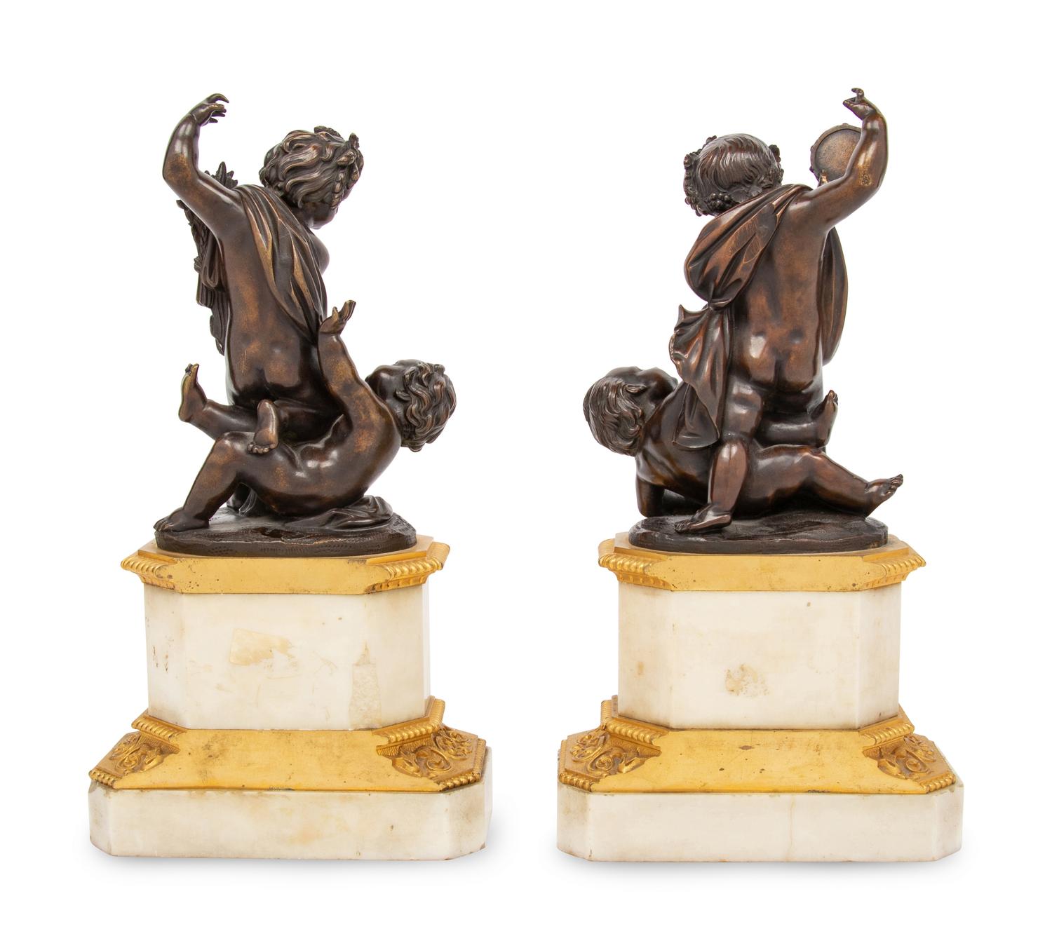A Pair of French Gilt and Patinated Bronze and Marble Ornaments