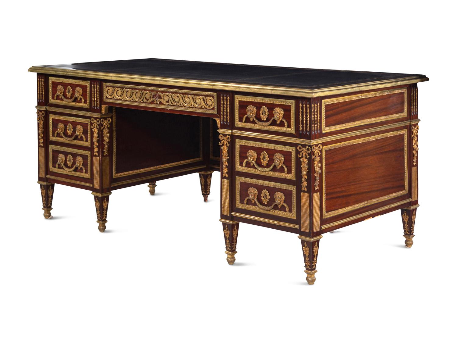 A Louis XVI Style Gilt Bronze Mounted Mahogany Pedestal Desk