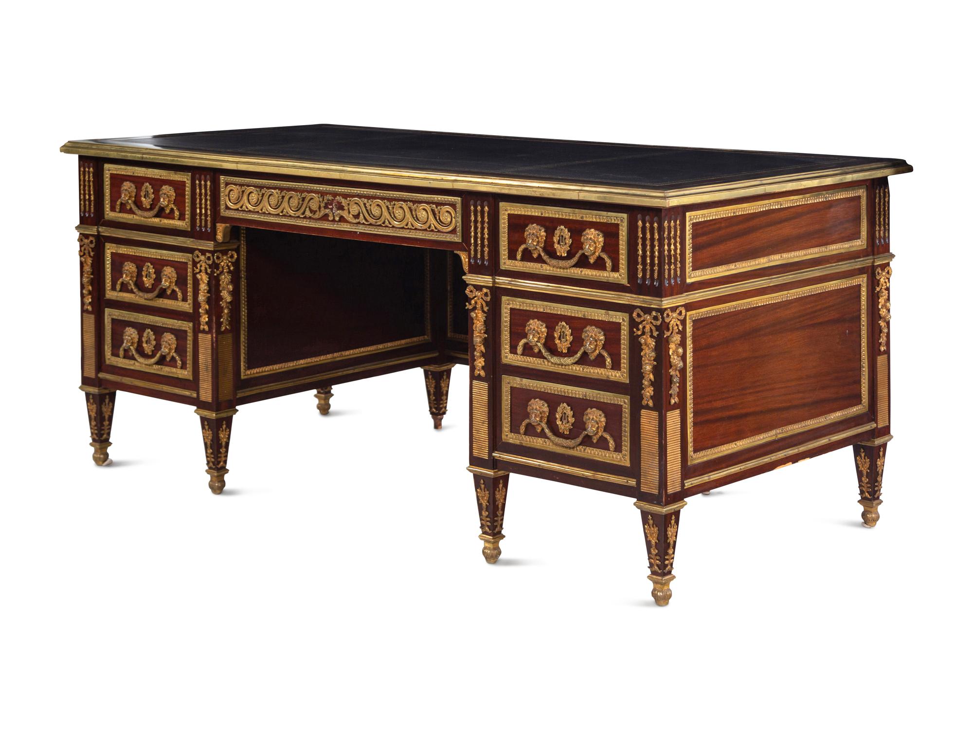 A Louis XVI Style Gilt Bronze Mounted Mahogany Pedestal Desk