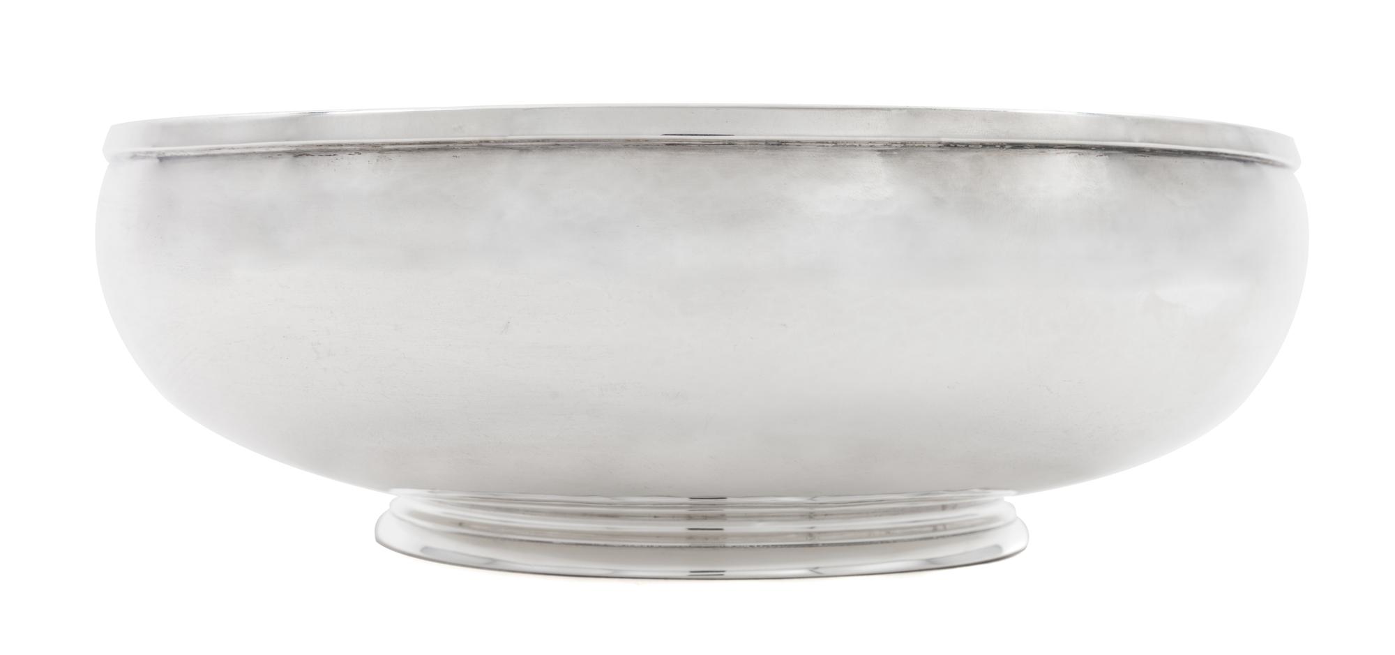 An American Silver Center Bowl, Erickson Silver Shop, Gardner, MA, having a rolled rim and a stepped base.