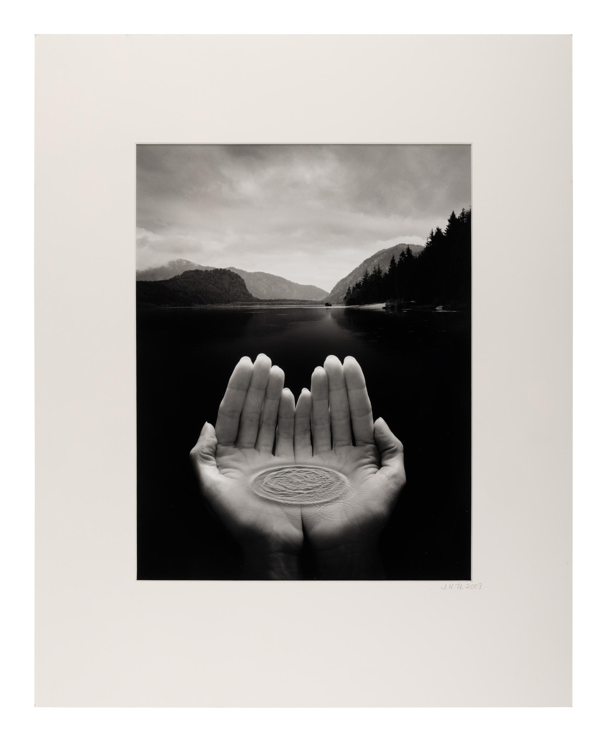 Jerry Uelsmann (1934-2022) Untitled (Hands holding water), 2002