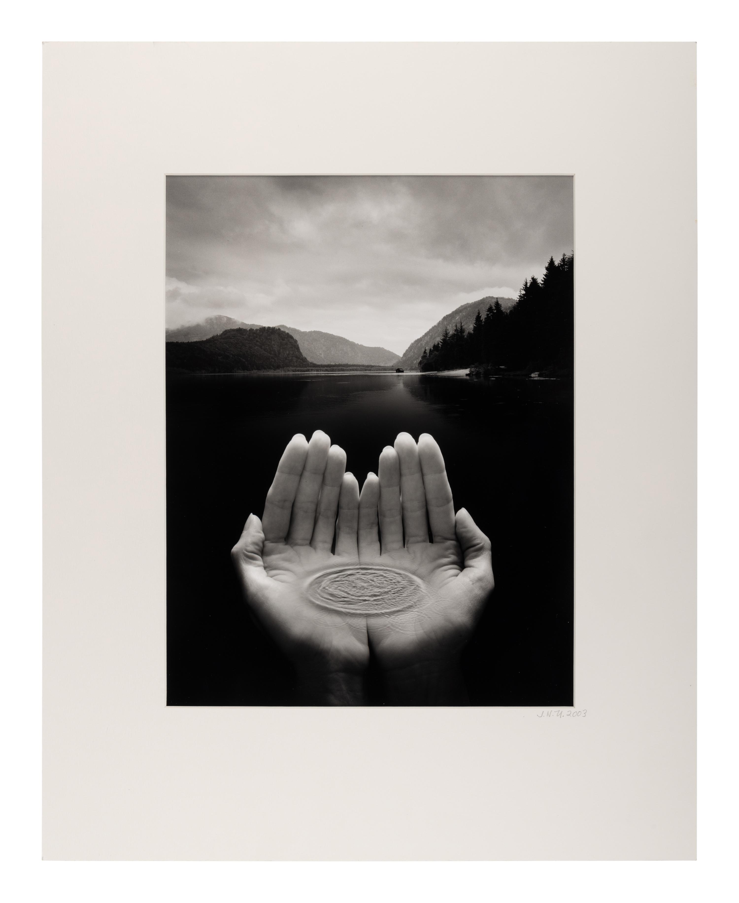 Jerry Uelsmann (1934-2022) Untitled (Hands holding water), 2002