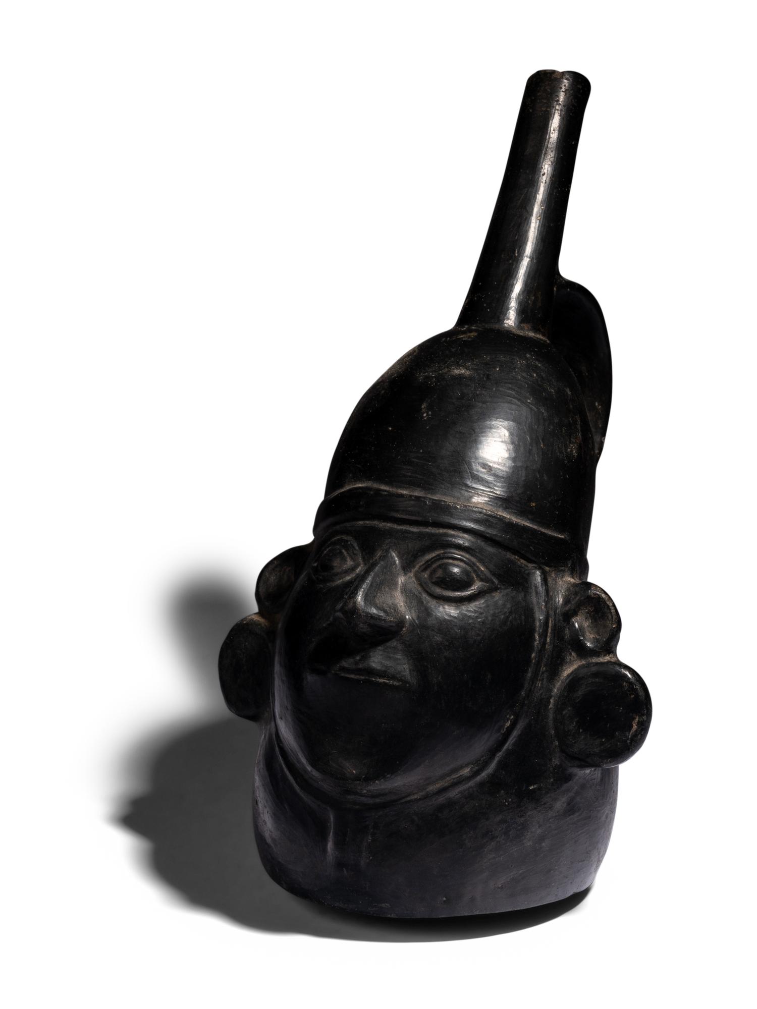 A Chimu Blackware Portrait Vessel