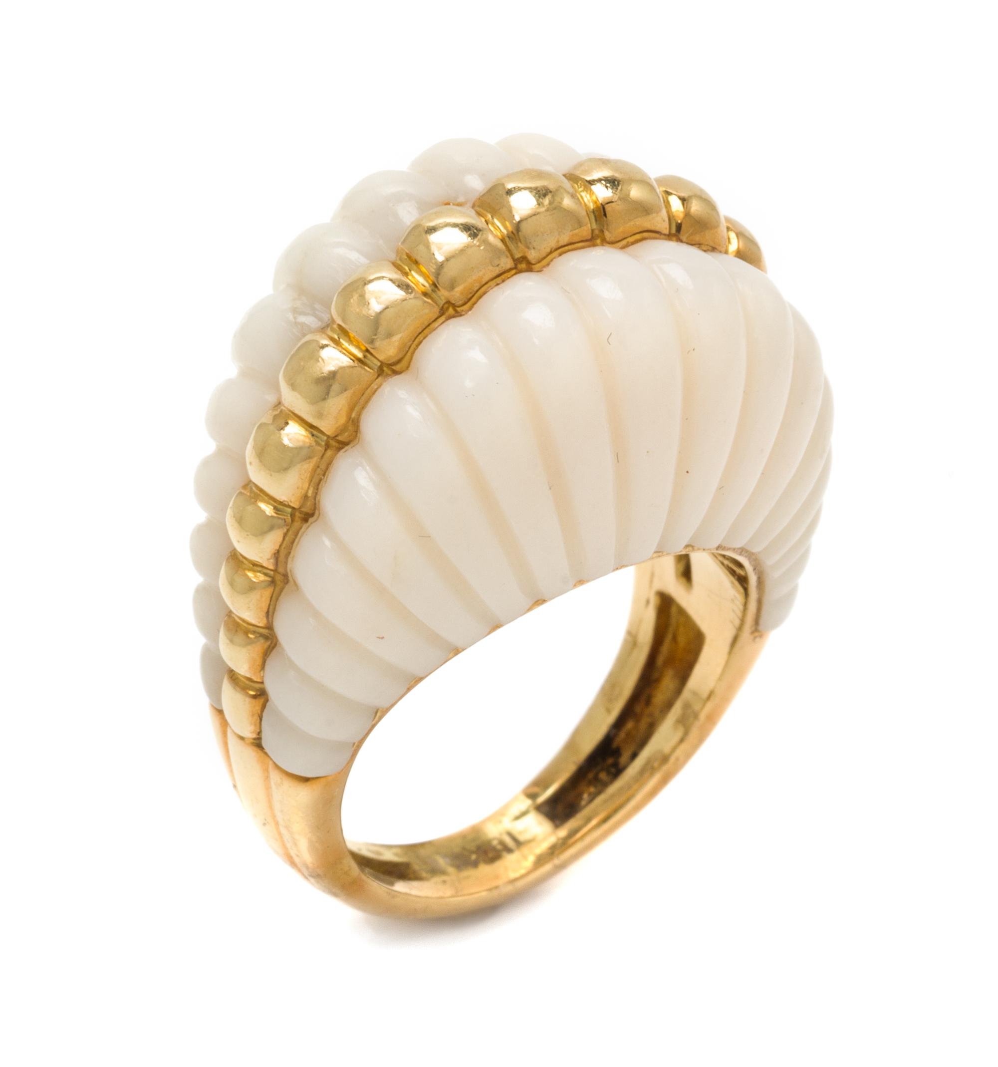 An 18 Karat Yellow Gold and White Coral Bombe Ring, 9.70 dwts.
