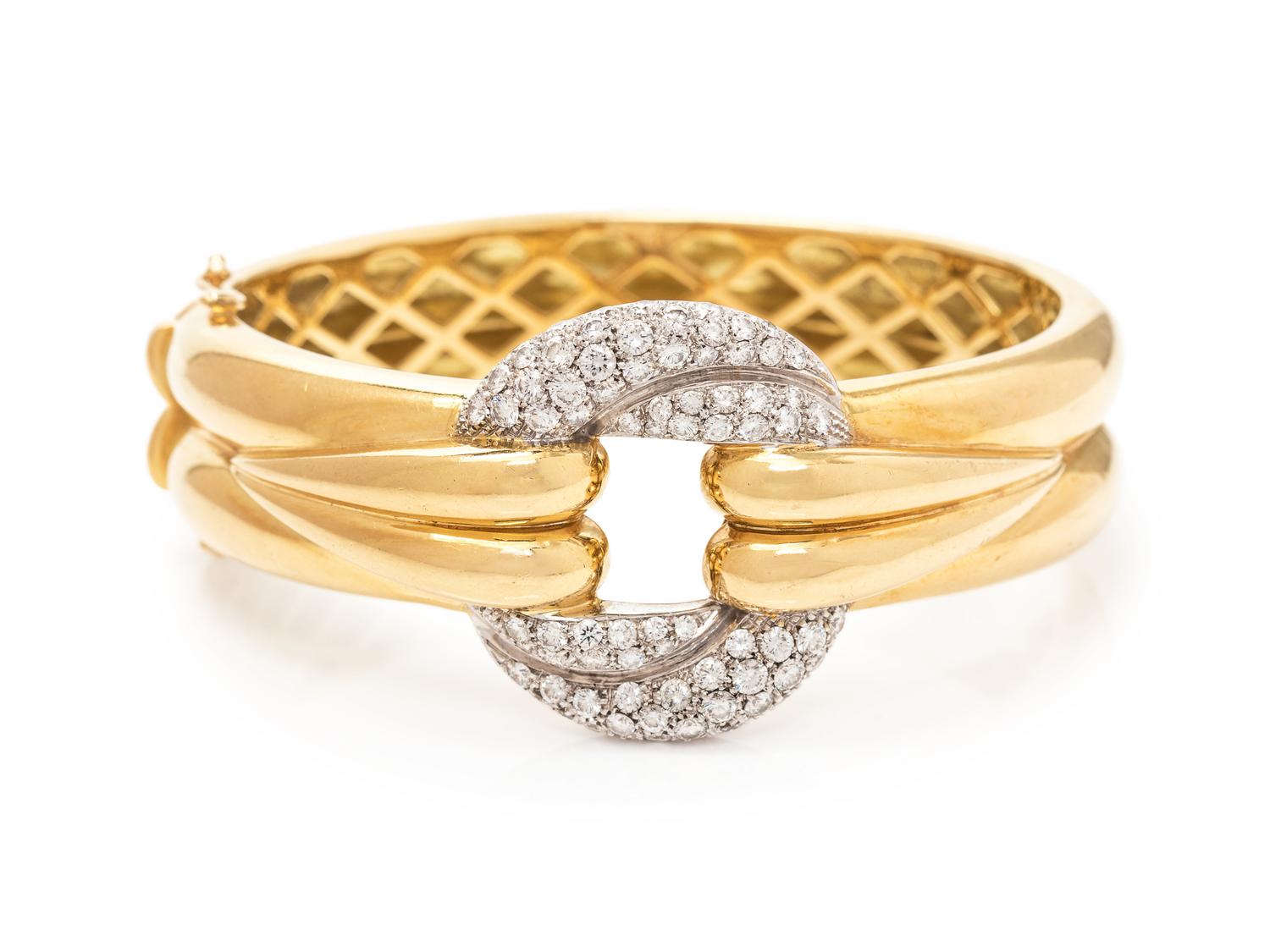 An 18 Karat Bicolor Gold and Diamond Bangle Bracelet,